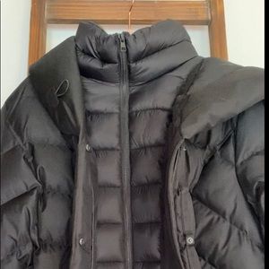 Long, semi-fitted, brushed down coat. Hood, thumbhole cuffs, fleece pockets XXL